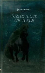 Jednorożec. Przez most we mgle REA. Autor: Vollenbruch Astrid. Dobreksiazki.pl Okładka książki Jednorożec. Przez most we mgle REA