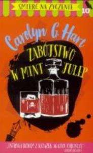 Śmierć na życzenie T.10 Zabójstwo w Mint Julep. Autor: Hart Carolyn G.. Dobreksiazki.pl Okładka książki Śmierć na życzenie T.10 Zabójstwo w Mint Julep
