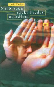 Na brzegu rzeki Piedry... BR w.2011. Autor: Paulo Coelho. Dobreksiazki.pl Okładka książki Na brzegu rzeki Piedry... BR w.2011