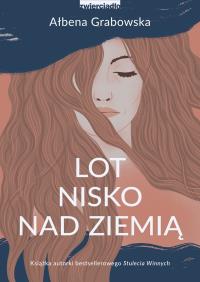 Lot nisko nad ziemią - uszkodzone. Autor: Grabowska Ałbena. Dobreksiazki.pl Okładka książki Lot nisko nad ziemią - uszkodzone