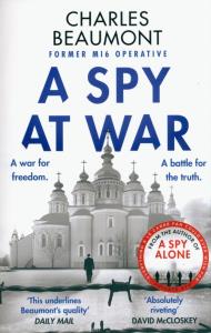 A Spy at War. Autor: Beaumont Charles. Dobreksiazki.pl Okładka książki A Spy at War