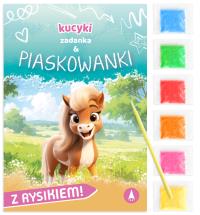 Zadanka & piaskowanki. Kucyki. Autor: Wioleta Żyłowska. Dobreksiazki.pl Okładka książki Zadanka & piaskowanki. Kucyki