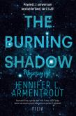 Okładka książki The Burning Shadow. Magiczny pył. Hype wyd. 2023